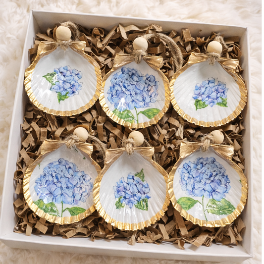 Hydrangea coastal seashell gift set with blue chinoiserie hydrangea design on gold edged scallop shells.